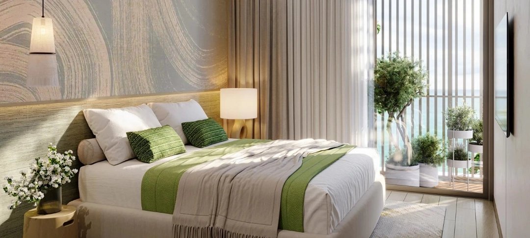 Laguna Lakeside Residences — bedroom opening onto a planted balcony